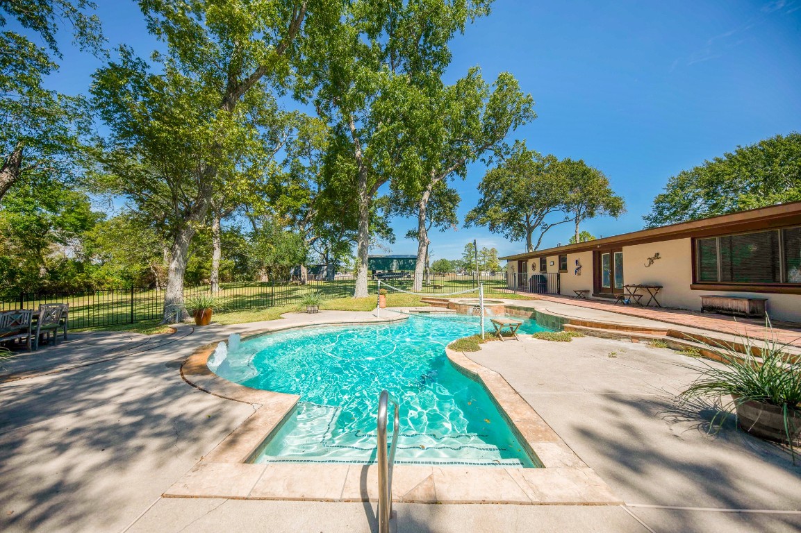 a view of a house with swimming pool