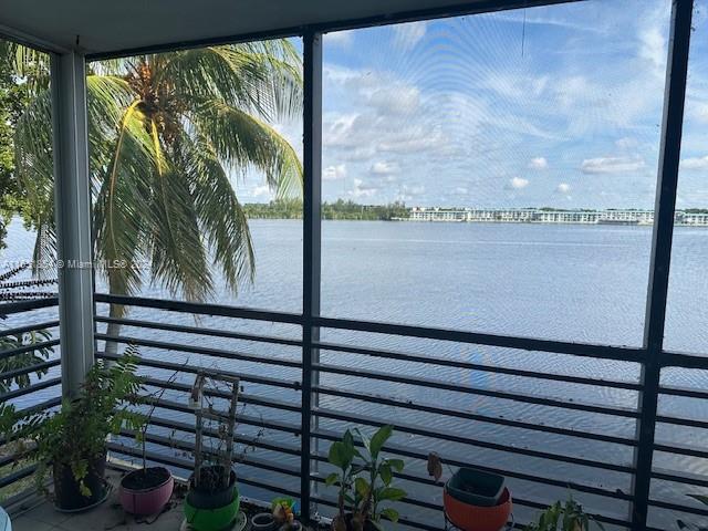 a view of a lake from a balcony