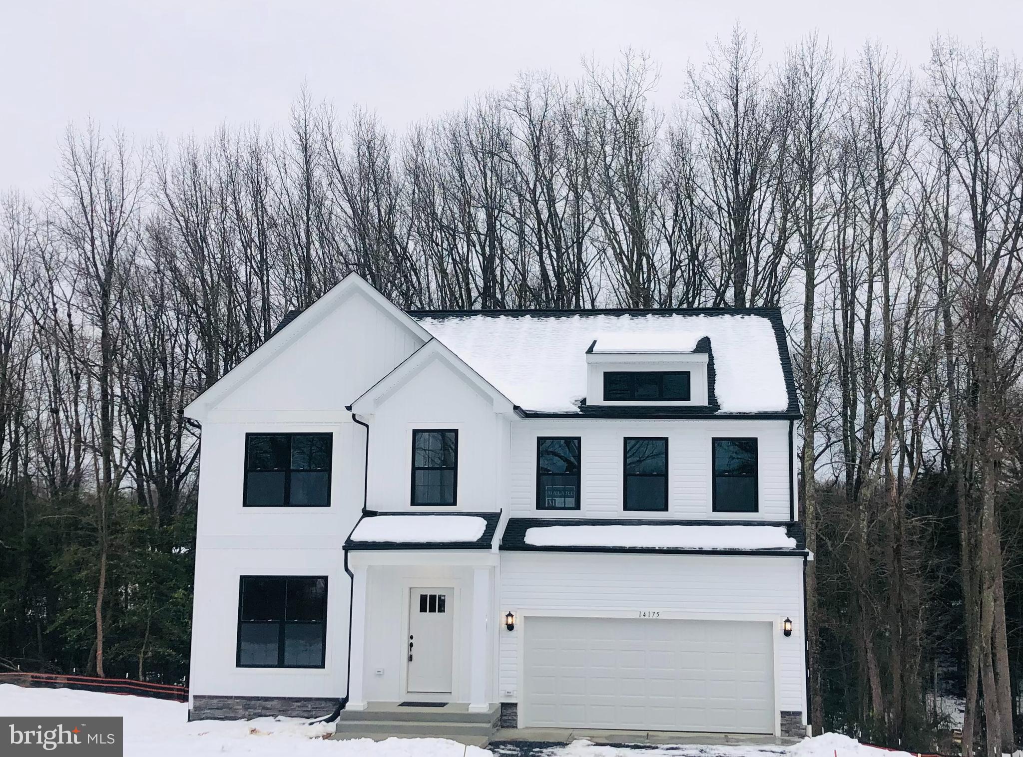 a house with trees in the background