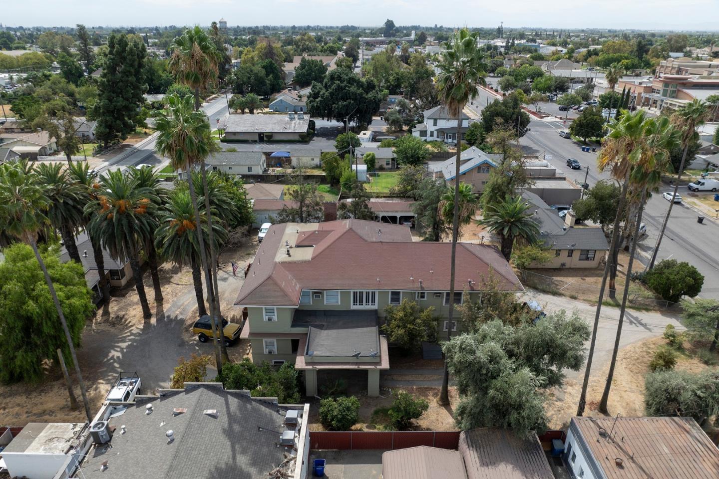 an aerial view of a house with a garden