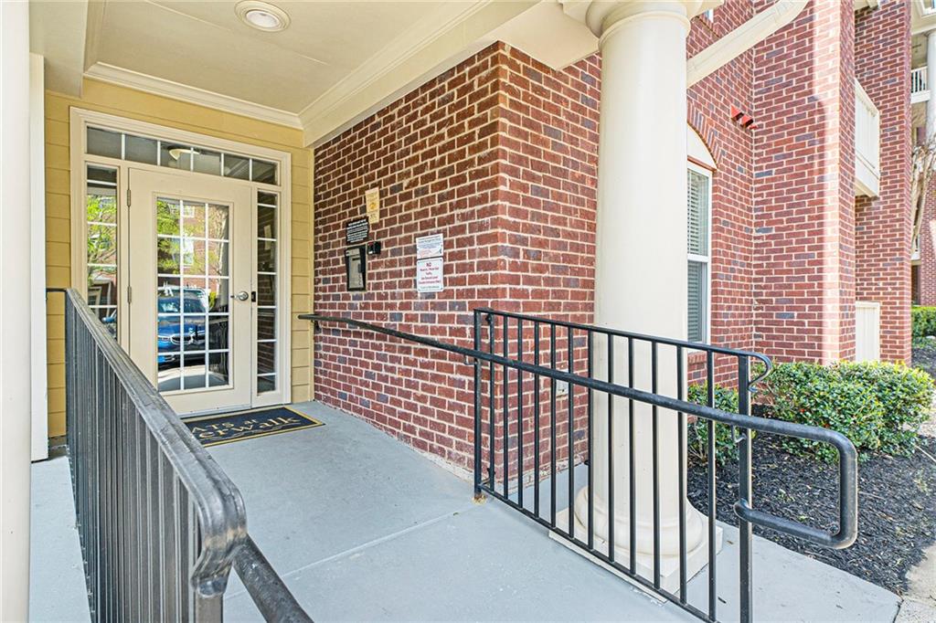 a view of a balcony with wooden floor