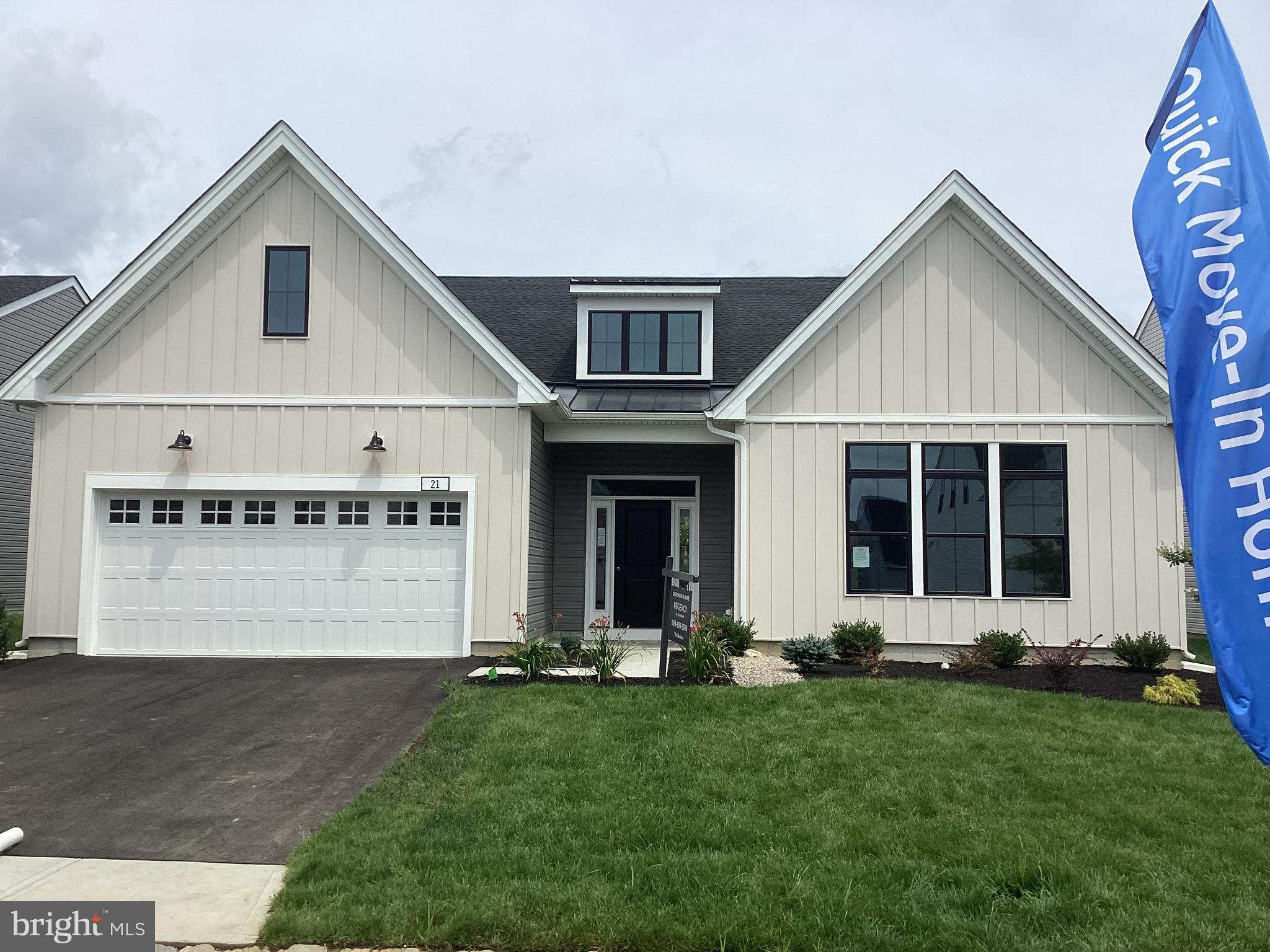 a view of front of house with a yard