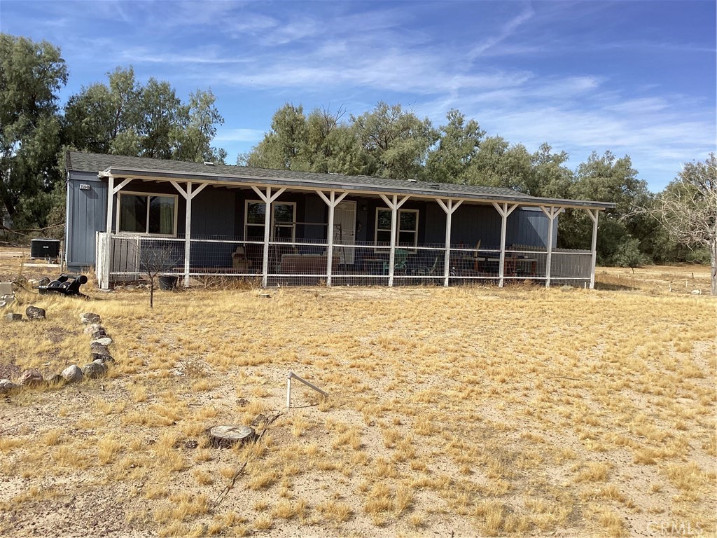 a view of front of house with parking space