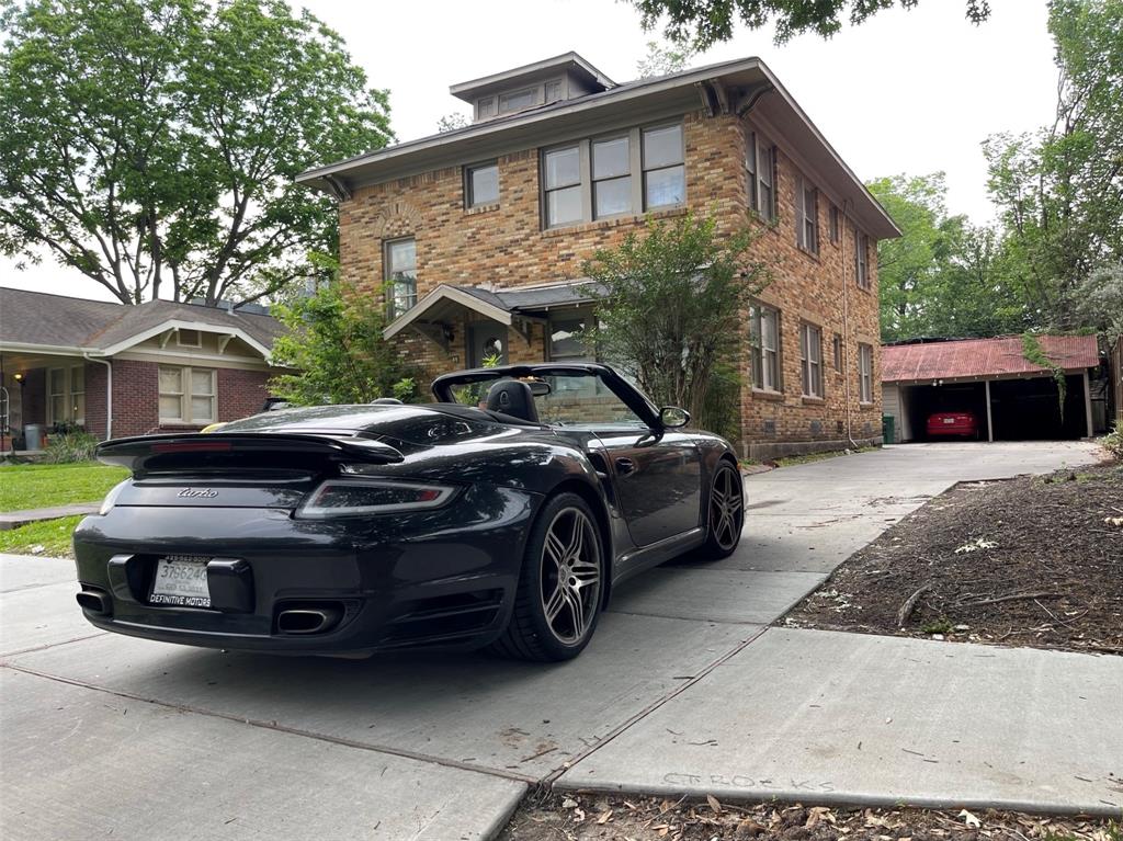 a car parked in front of a house