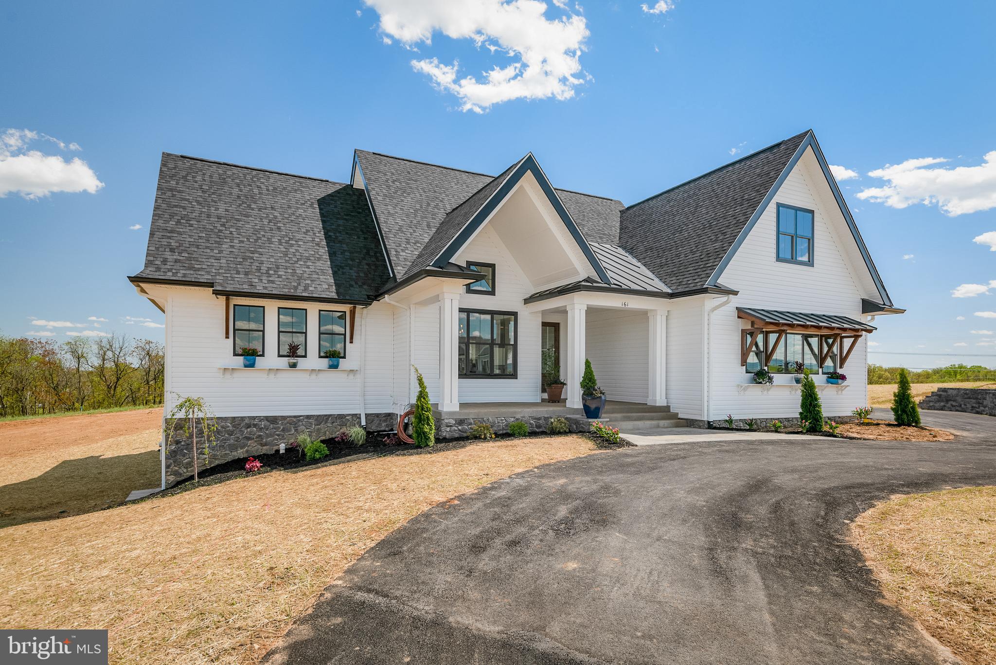 a front view of a house with a patio