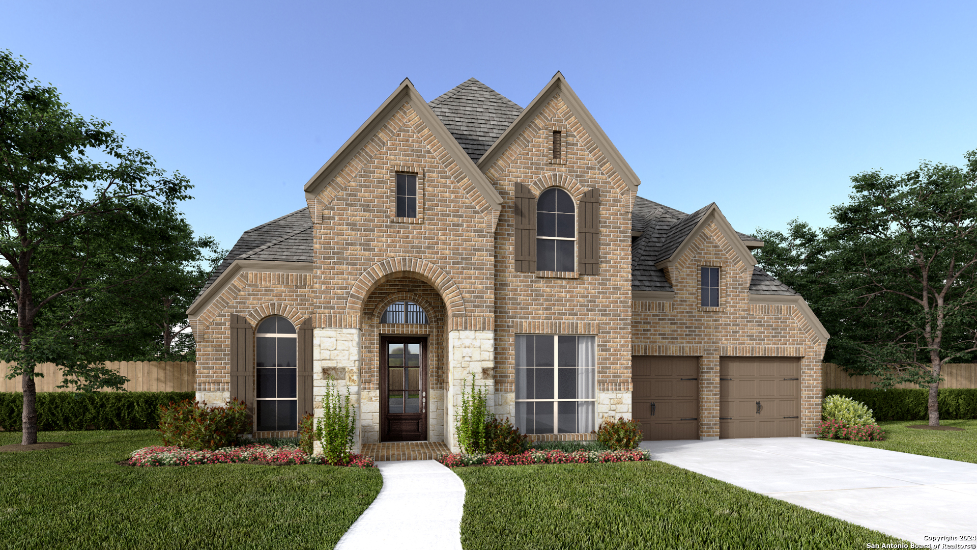 a front view of a house with garden