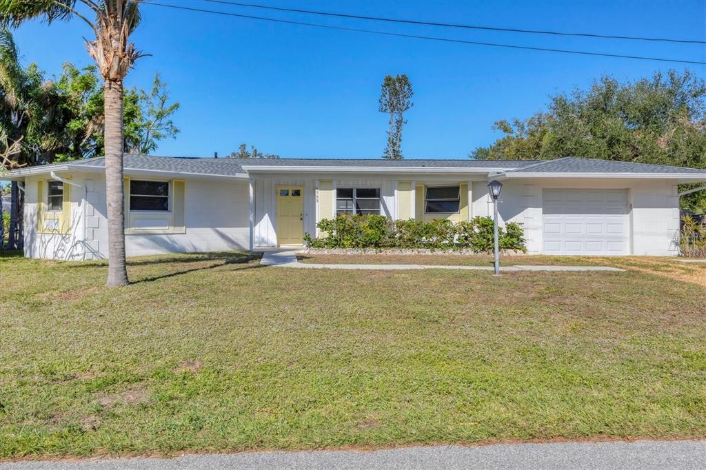 front view of a house with a yard