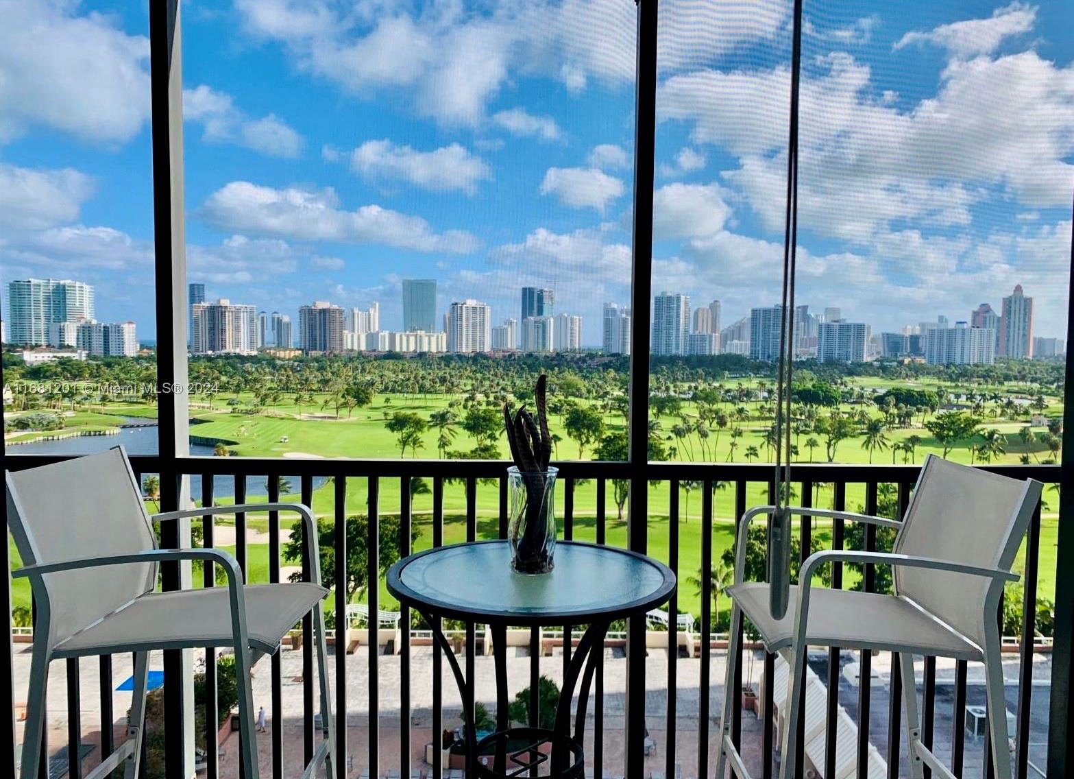 a view of a city from a chairs