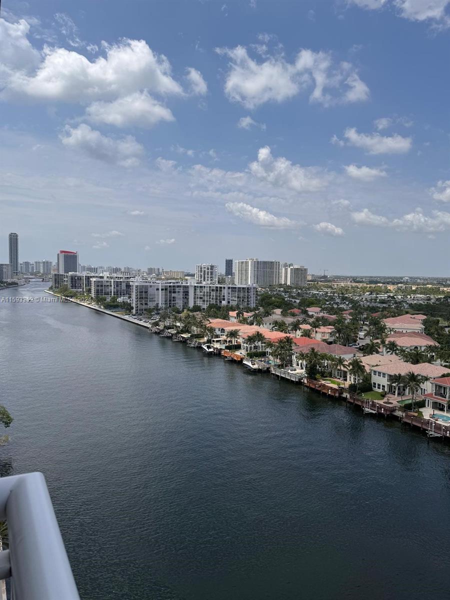 a view of a city and lake