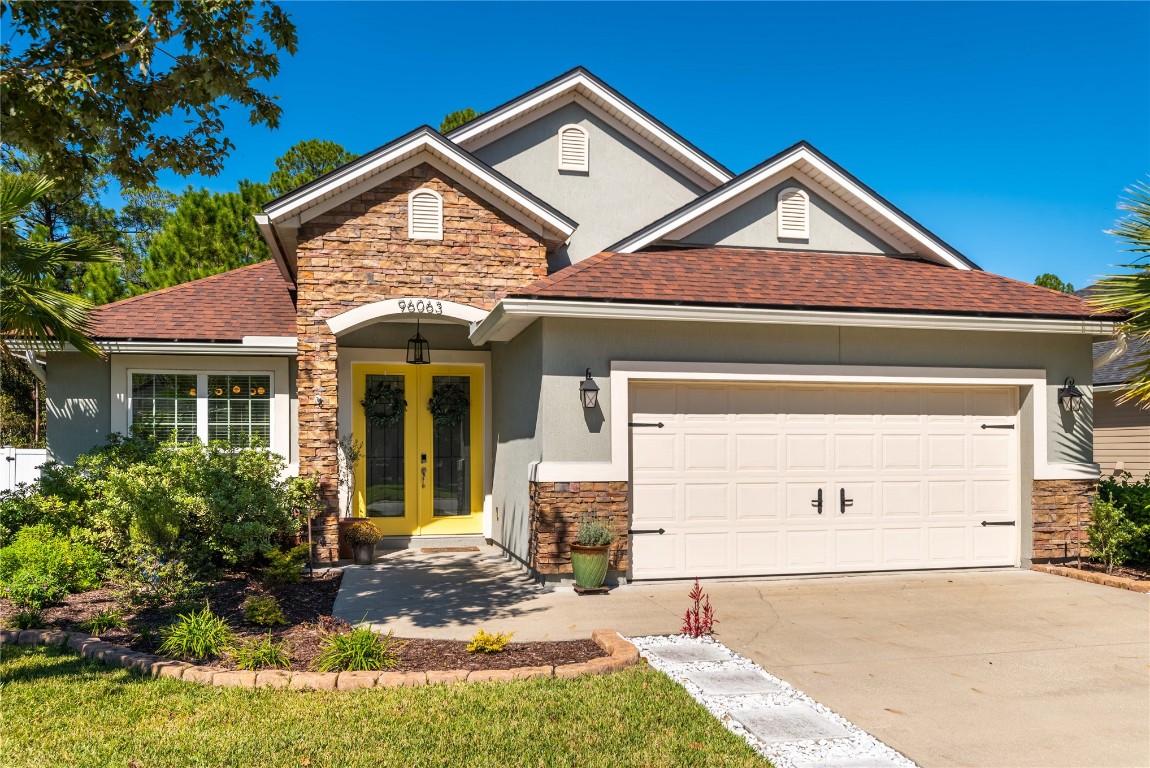 front view of a house with a yard