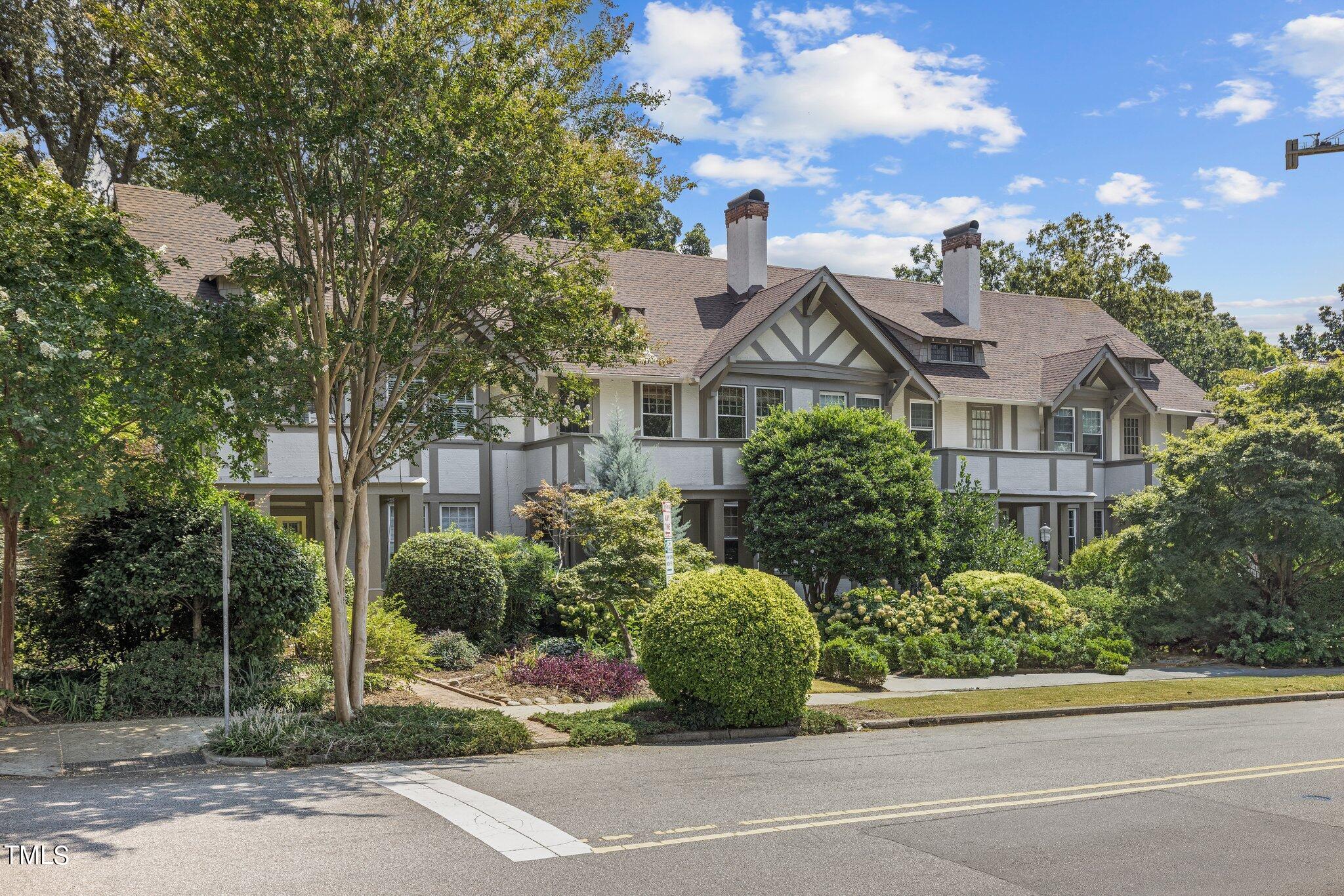 a view of a house with a garden