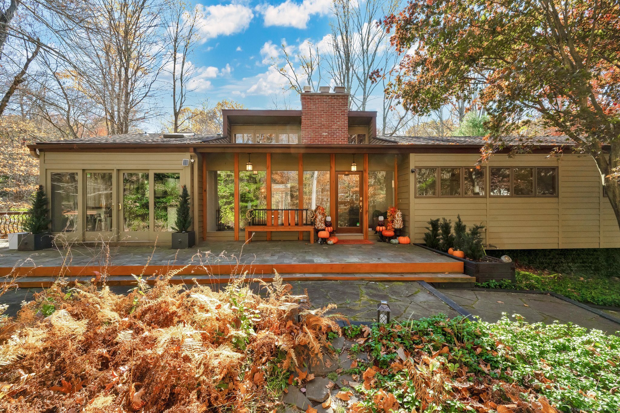 front view of a house with a patio