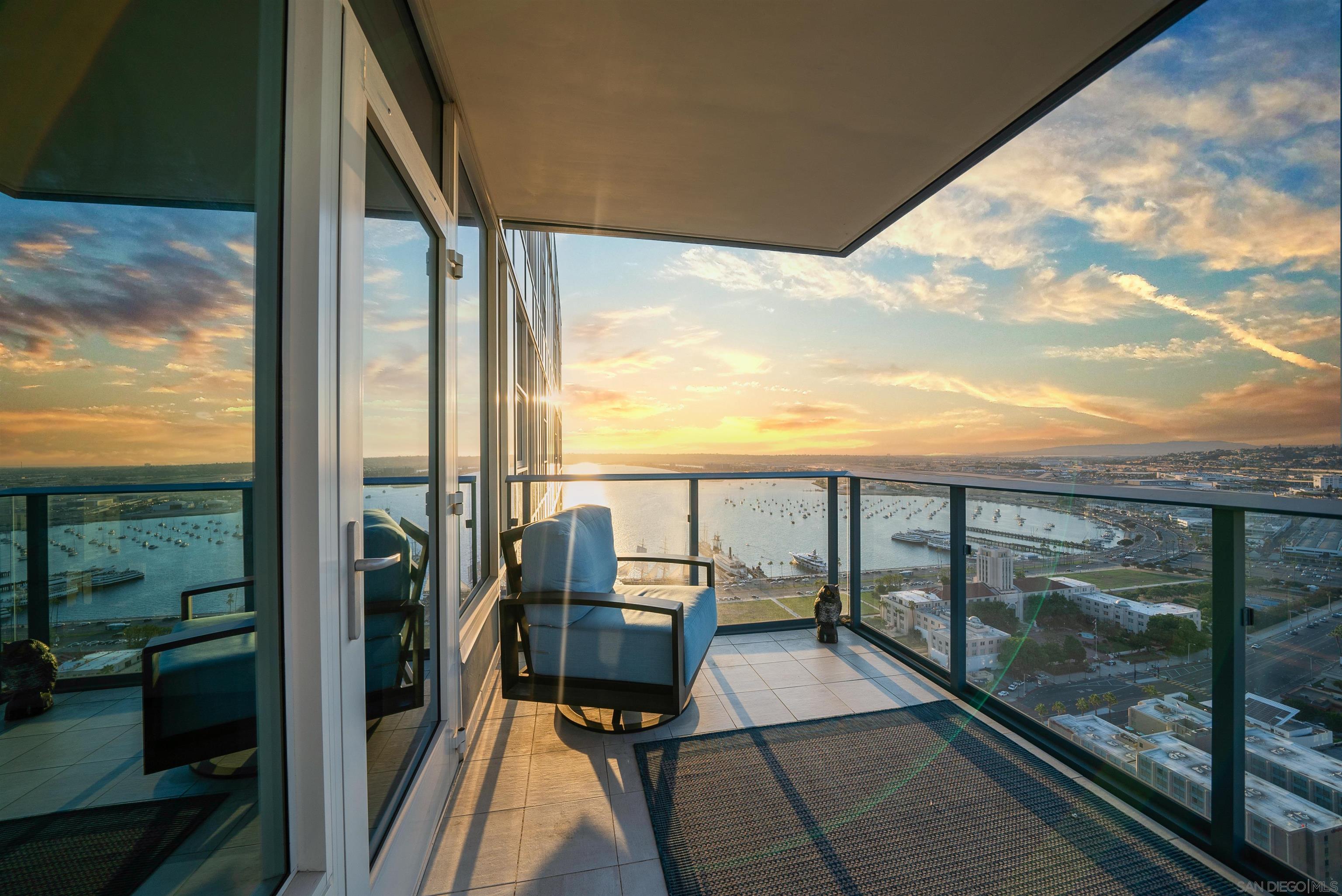 a view of a balcony with chairs