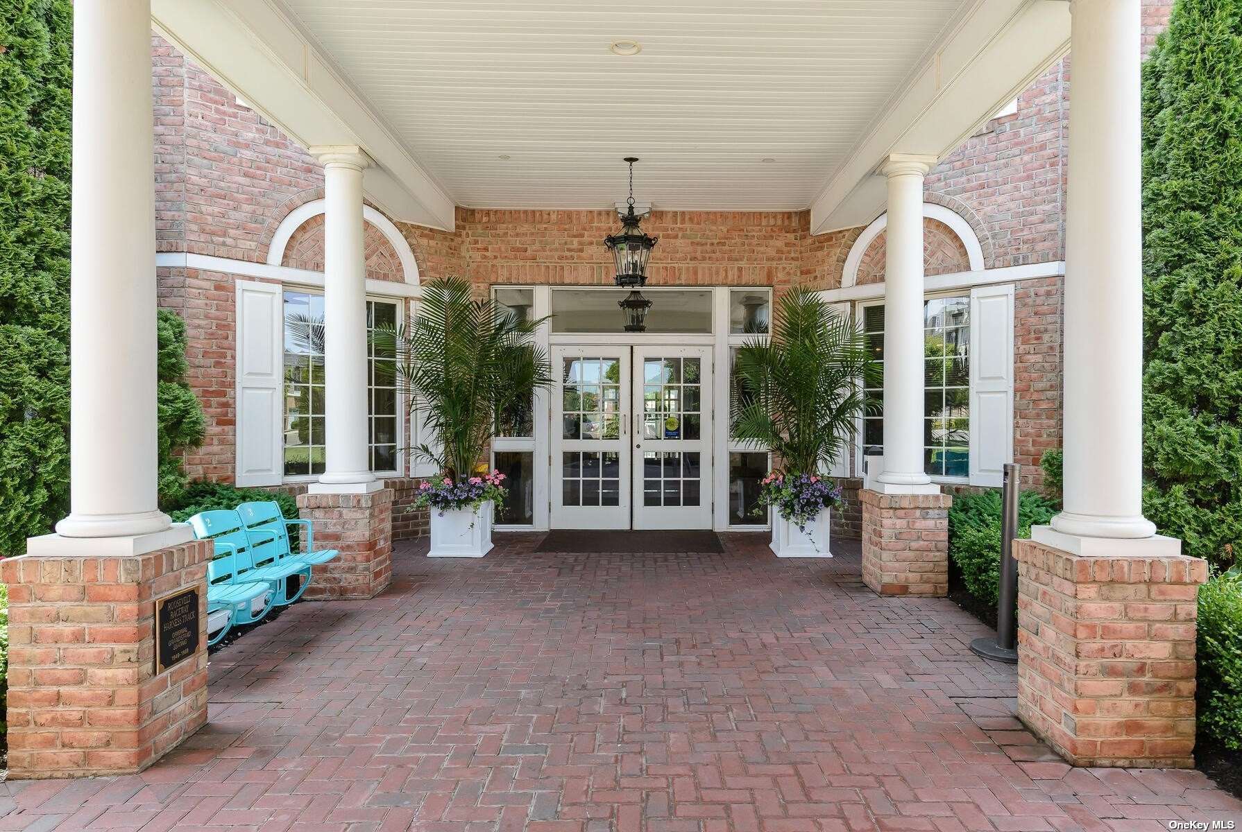 a front view of a house with outdoor space