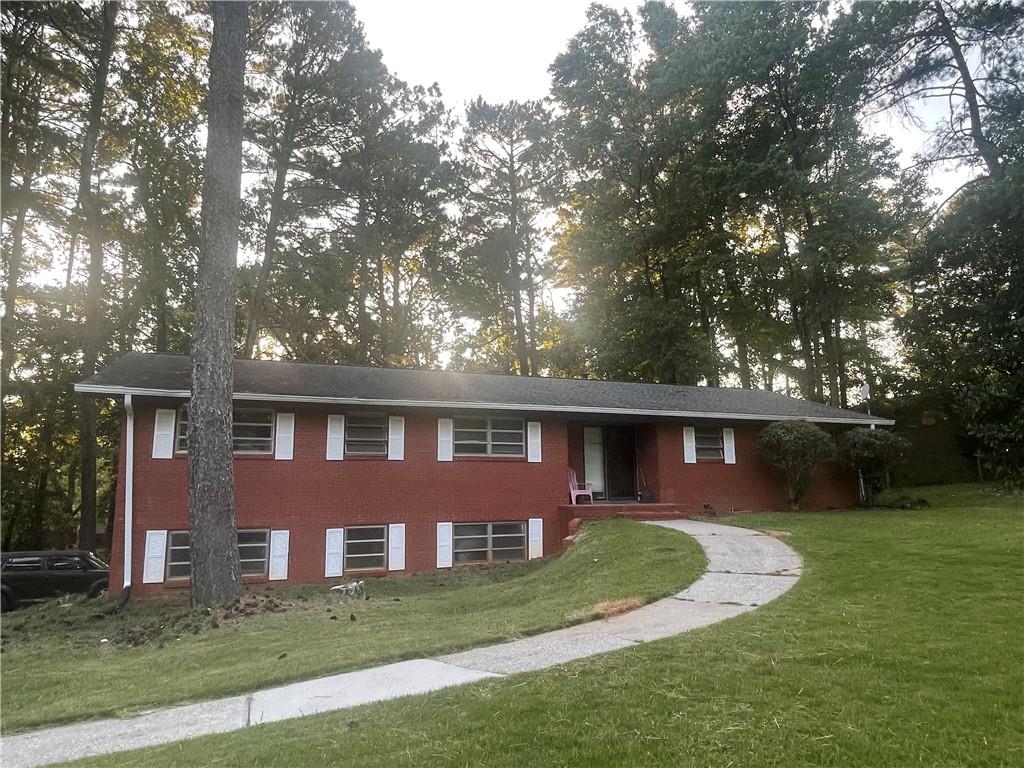 front view of a house with a yard