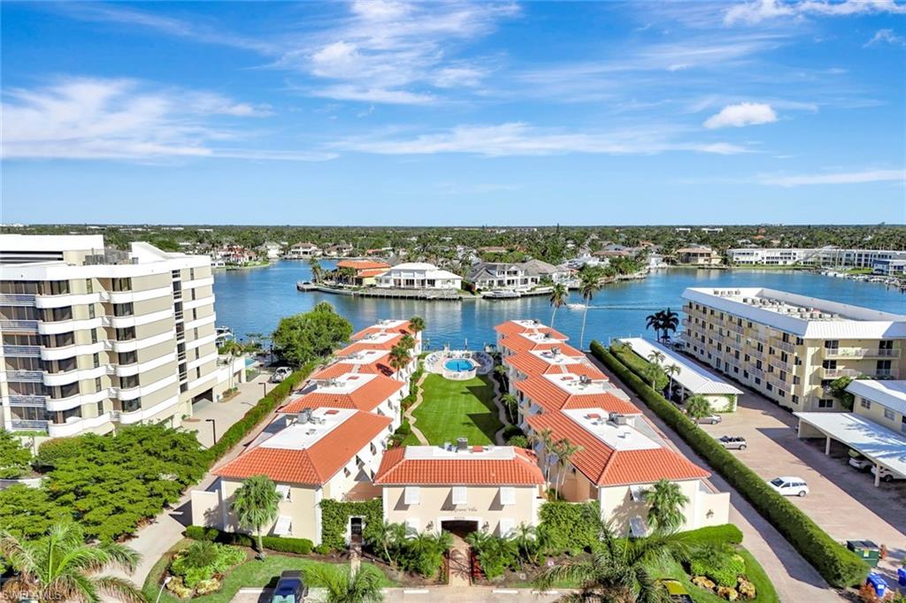 an aerial view of residential building and lake view