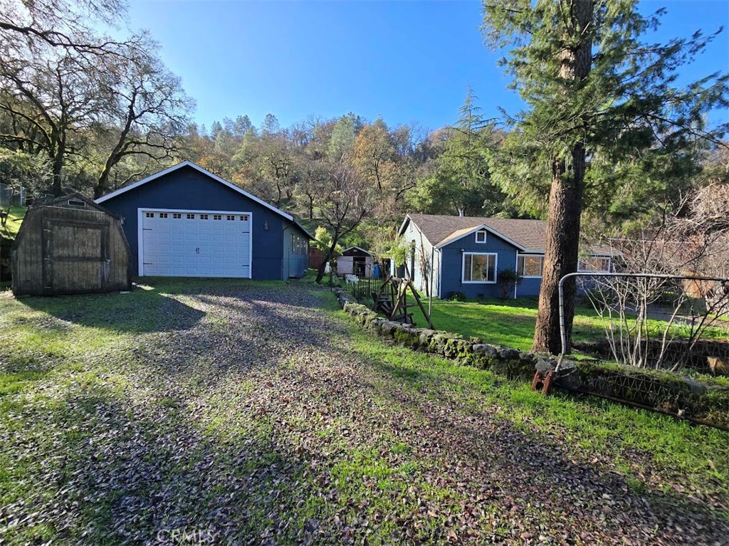 a house view with a garden space