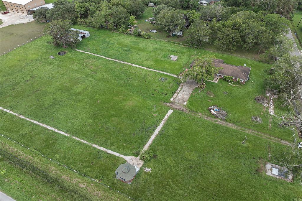 a view of a green field with clear sky