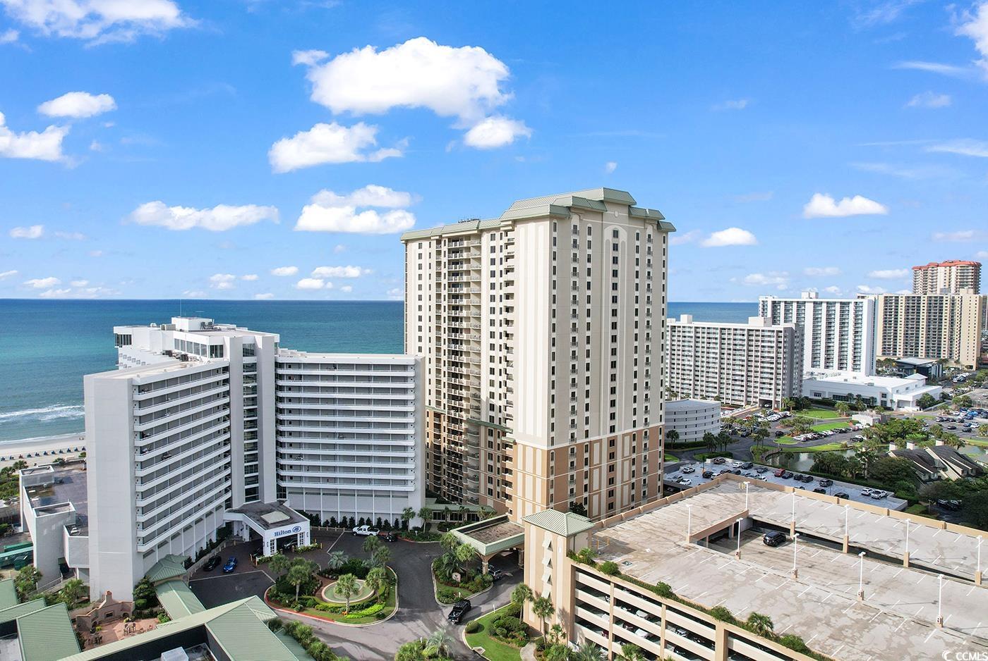 View of property featuring a water view