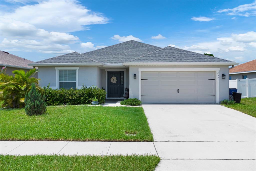 a front view of house with yard