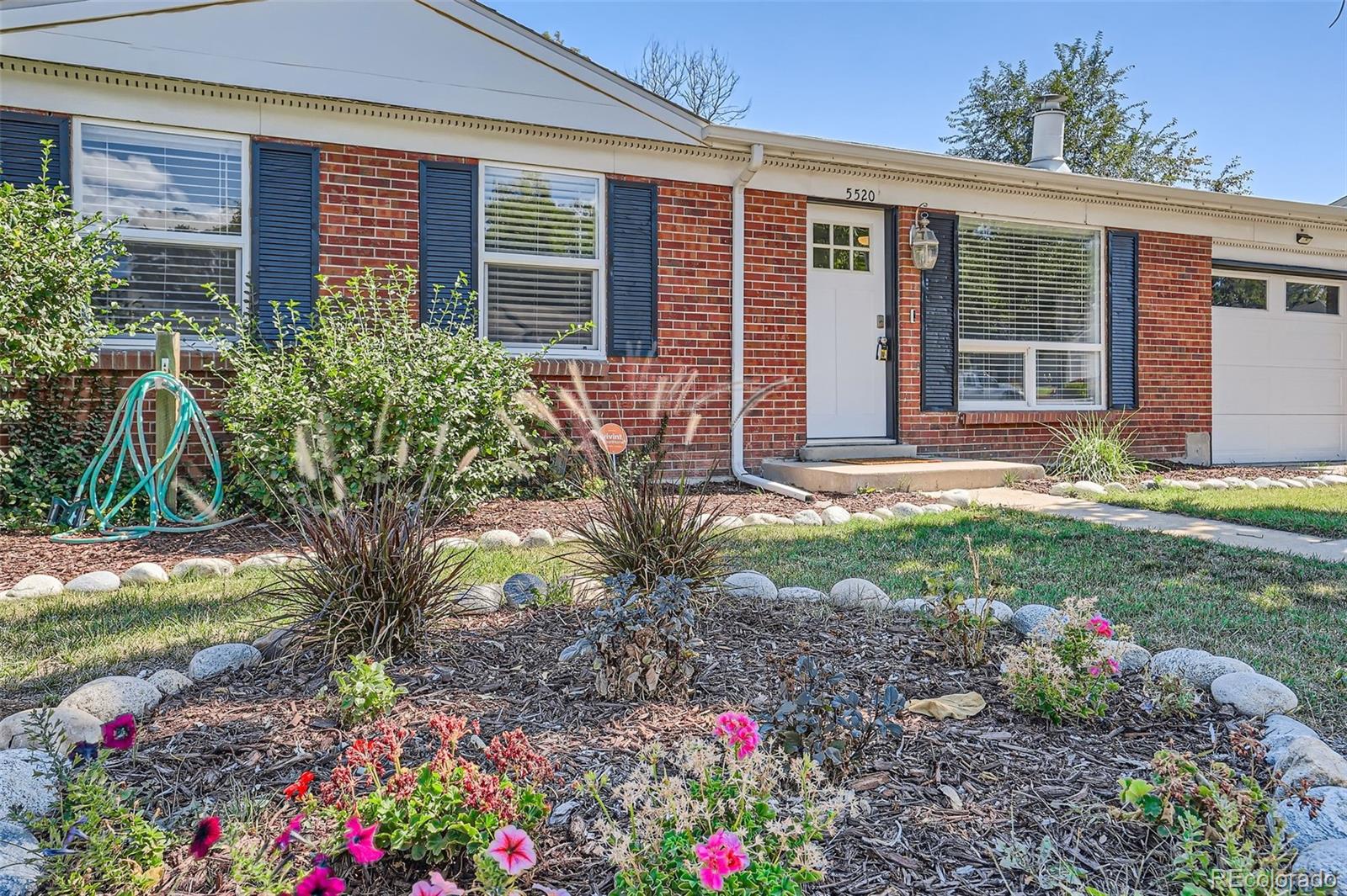 a house view with a garden space