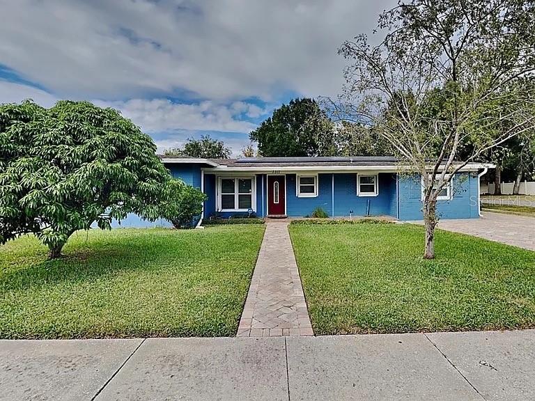 front view of a house with a yard