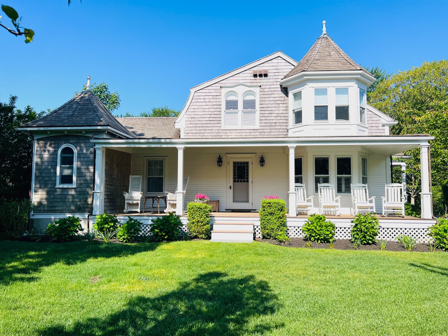 front view of a house with a yard