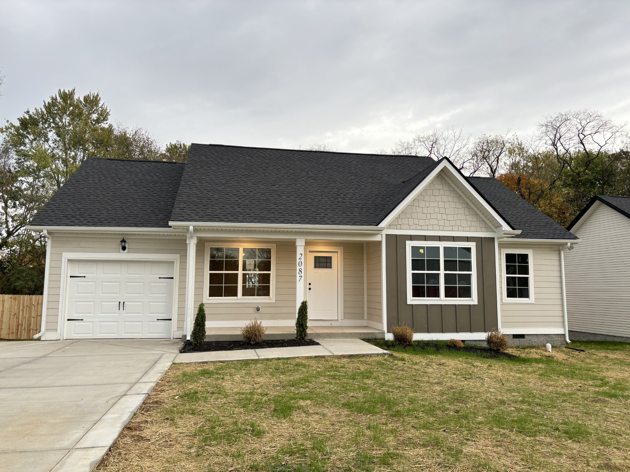 front view of a house with a yard