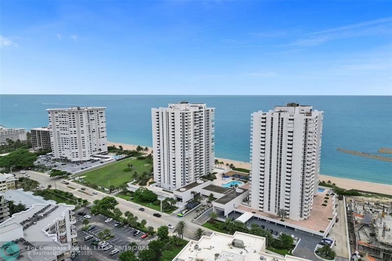 a view of city with tall buildings