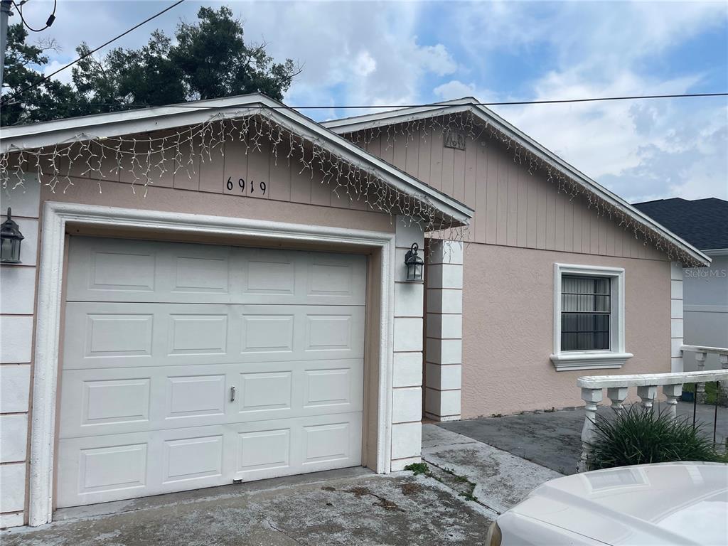 a close view of a house with a garage