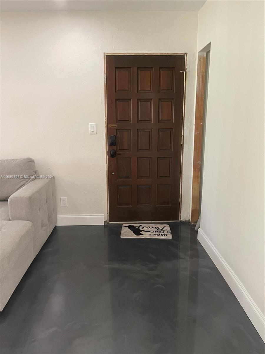 an empty room with a door