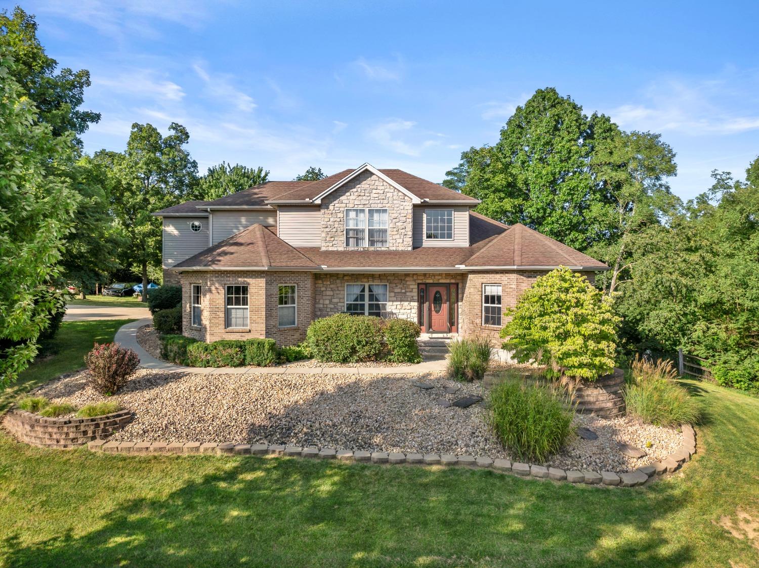 Your beautiful new Hidden Valley Lake home is a rare find - Custom built, first floor primary master suite, lots of upgrades and character, and it sits on just under one full acre!