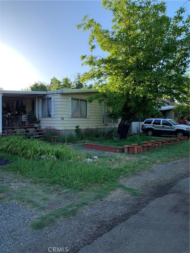 a house view with a garden space