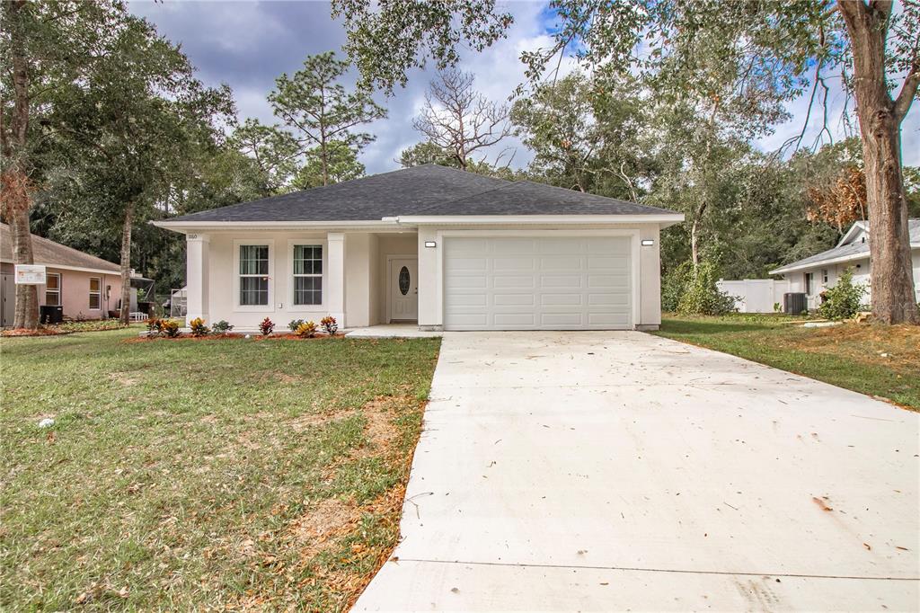 front view of house with a yard