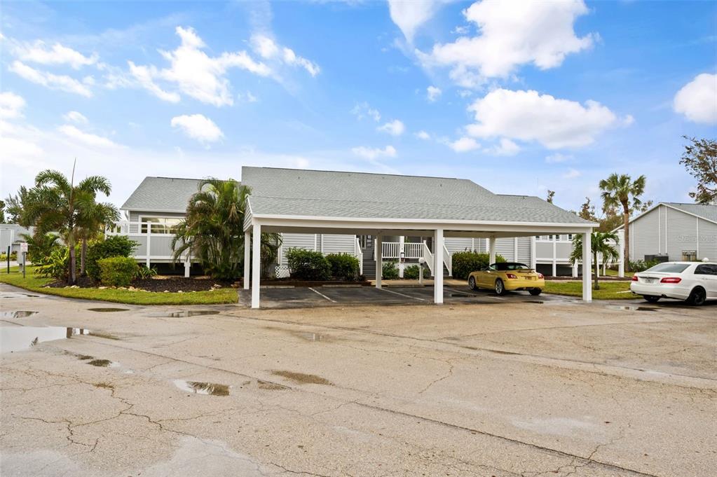 a view of a cars park in front of house