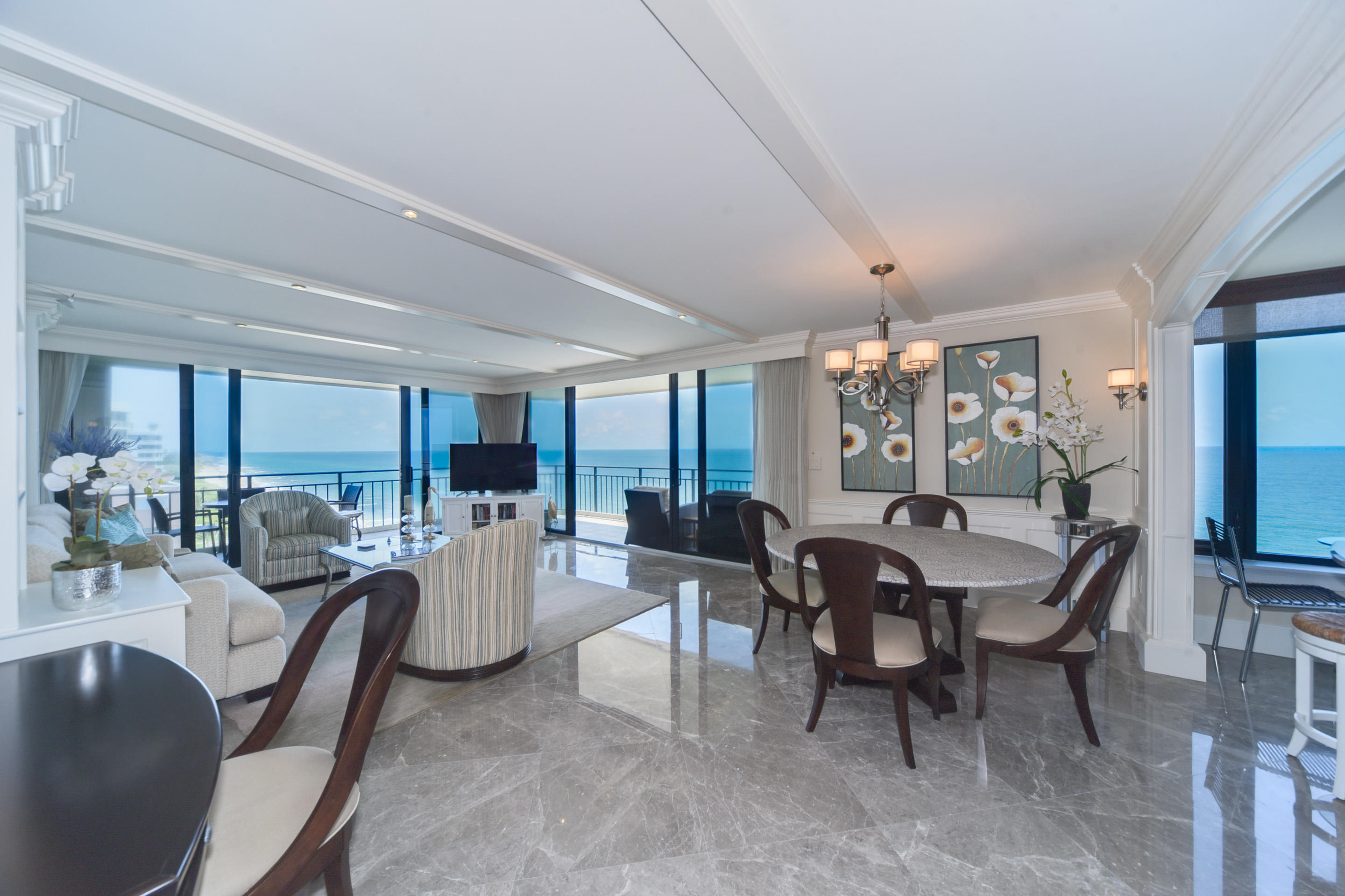 a view of a dining room with furniture window and outside view