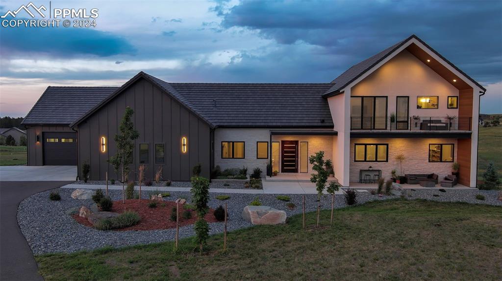 View of front home in the evening.