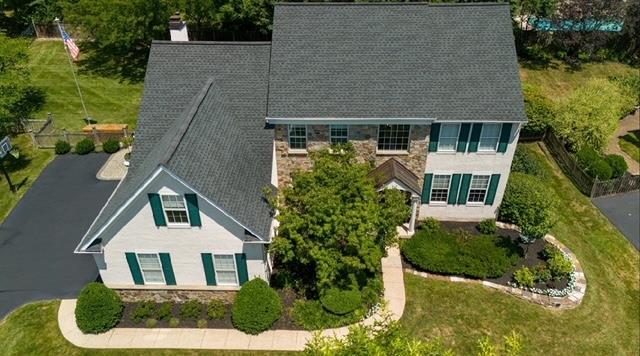 aerial view of house with yard