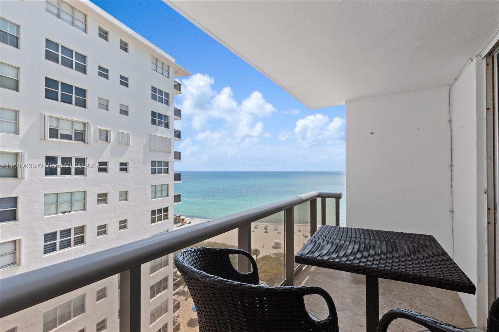 a view of balcony with furniture