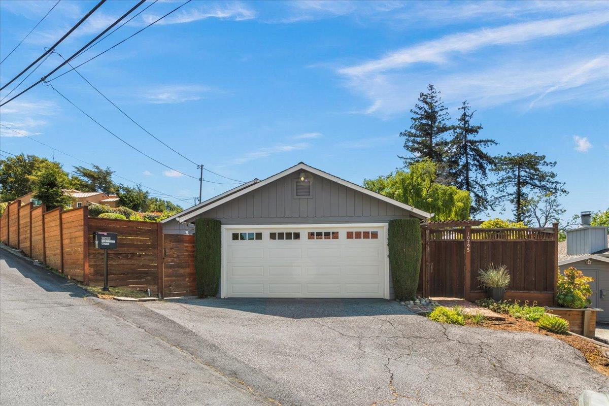 a front view of a house with a garage