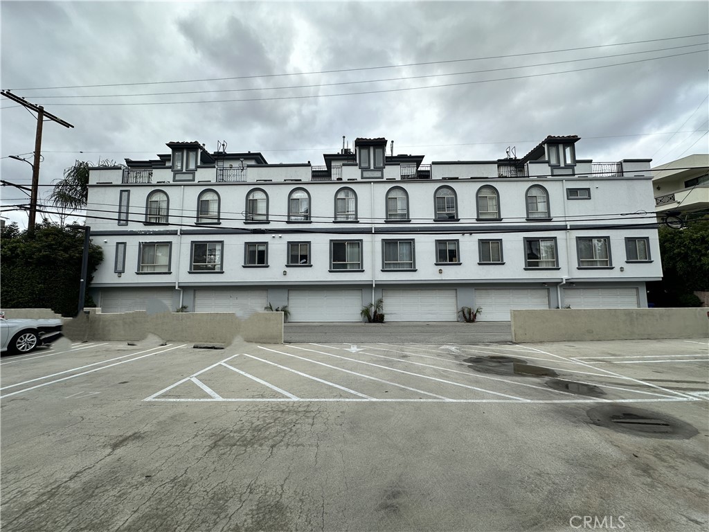 a view of a building with a street