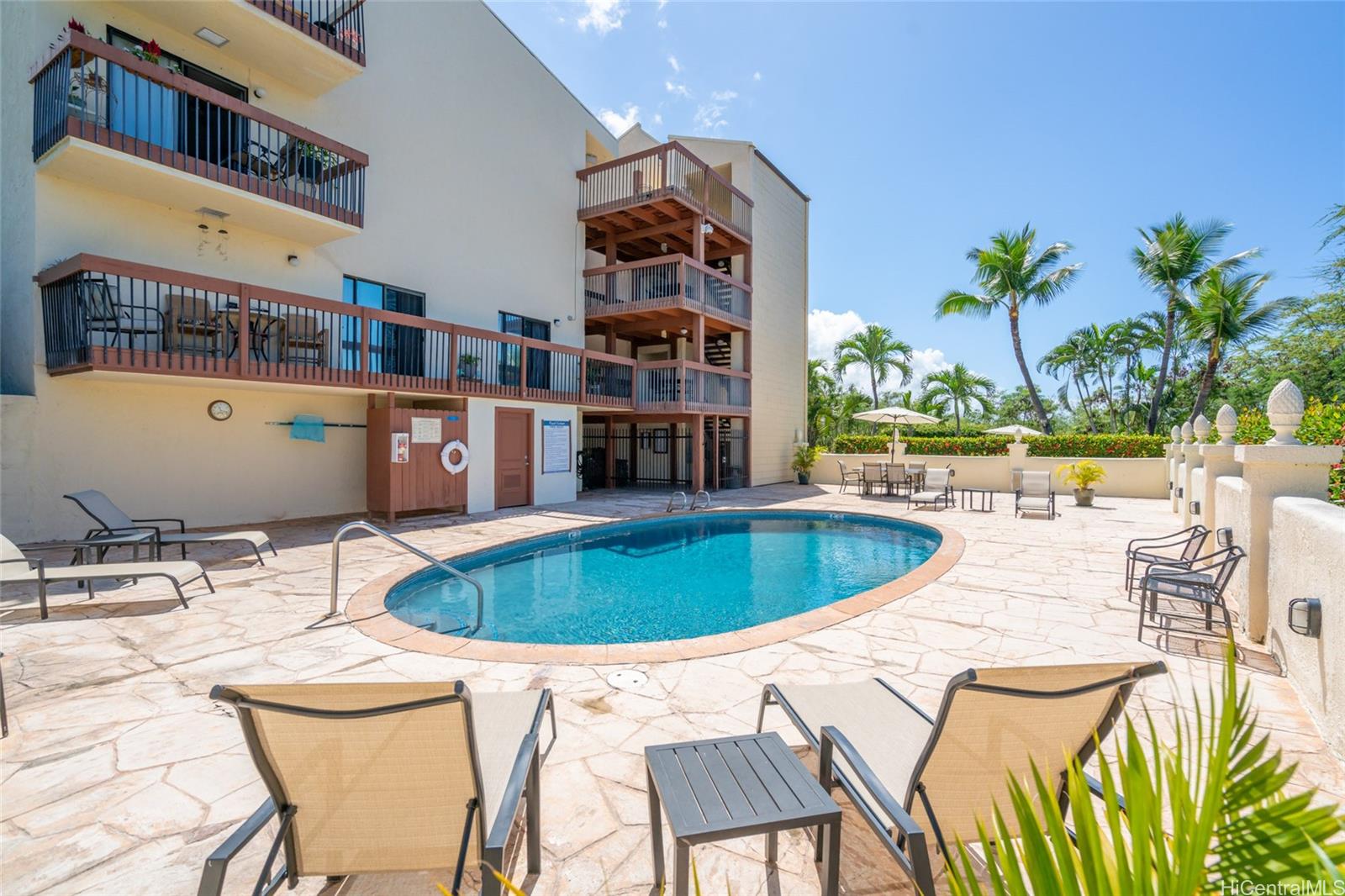 a view of a swimming pool with a patio