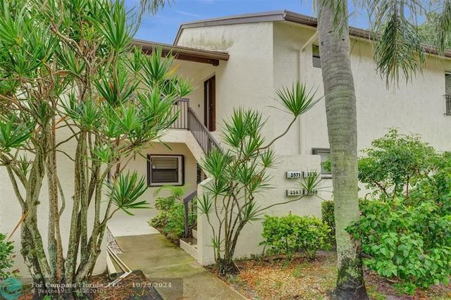 $299,900 | 2570 Carambola Circle North, Unit 18572 | Coral Gate