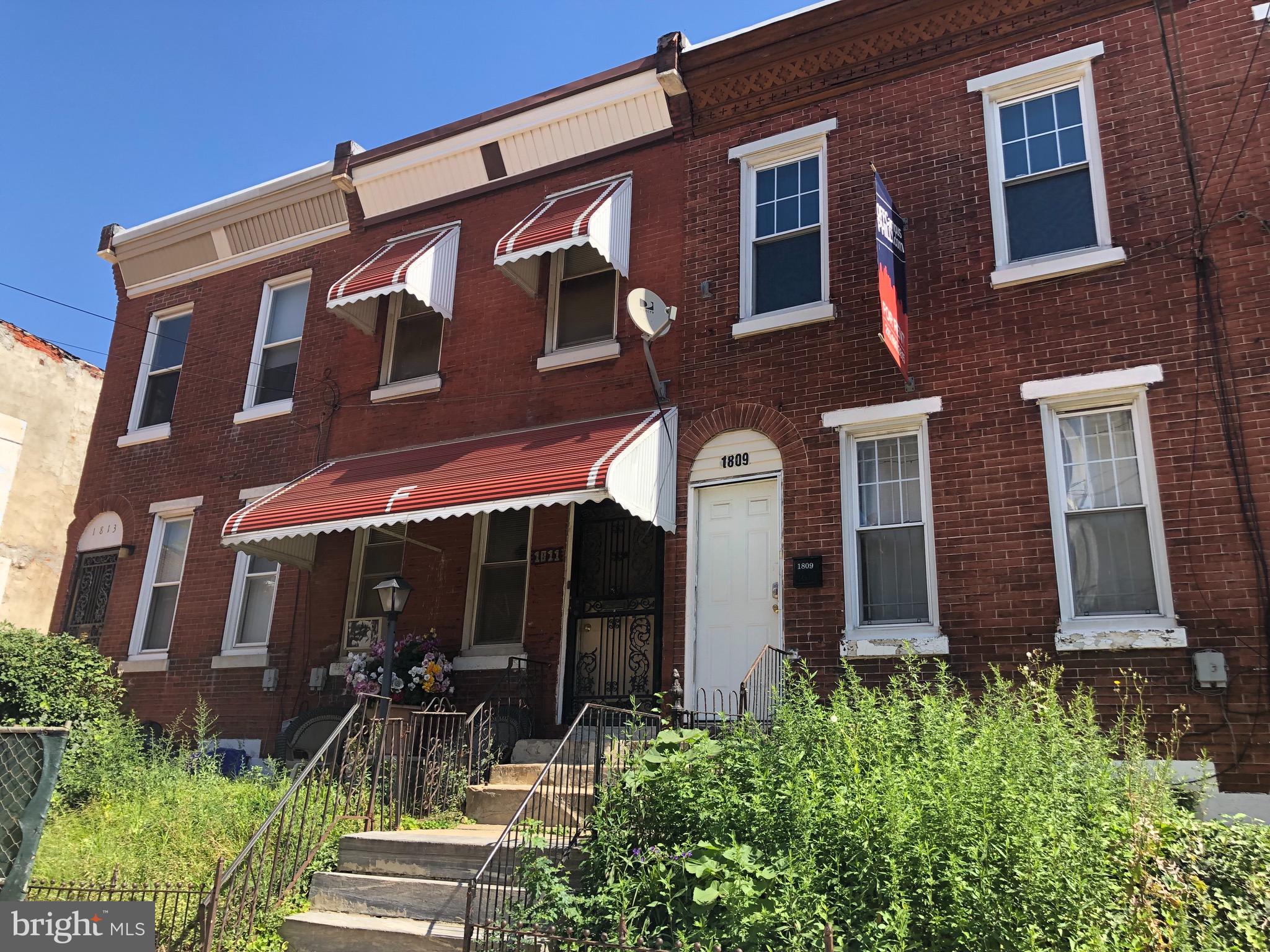 front view of house with a yard