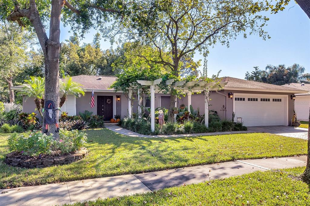 front view of a house with a yard