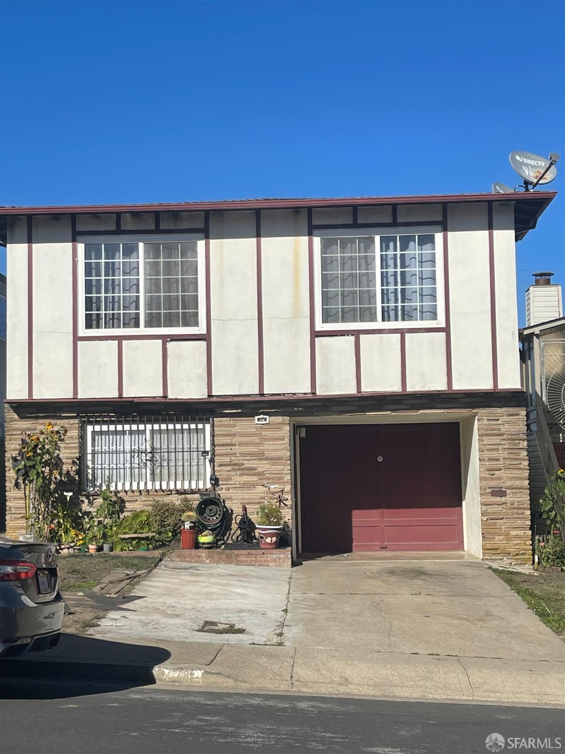 front view of a house with a street