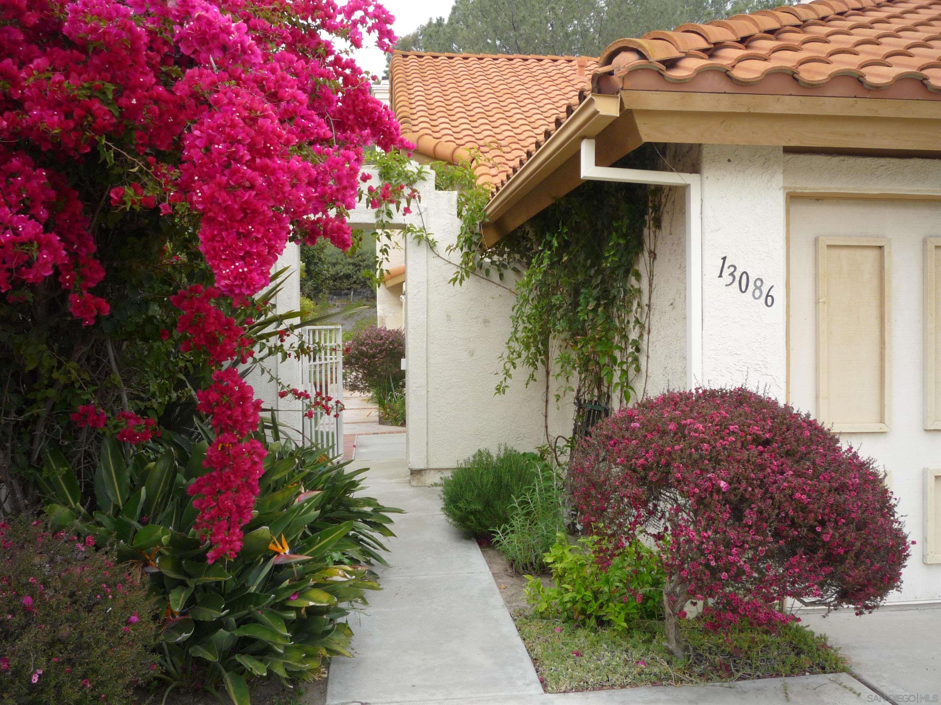 a house with a flower garden