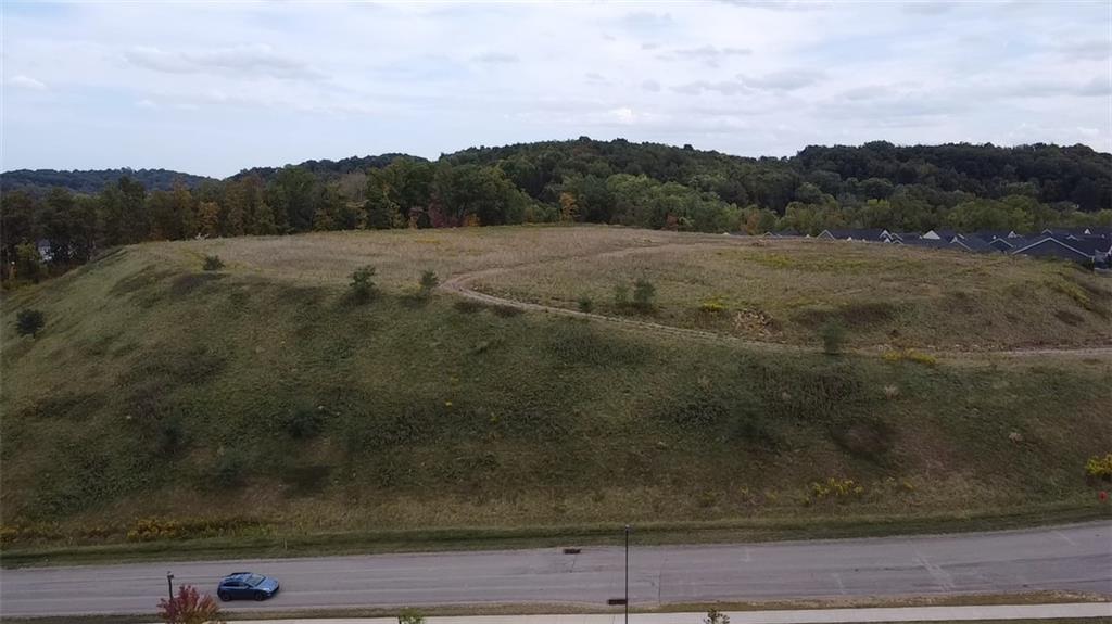 a view of a dry yard with mountain