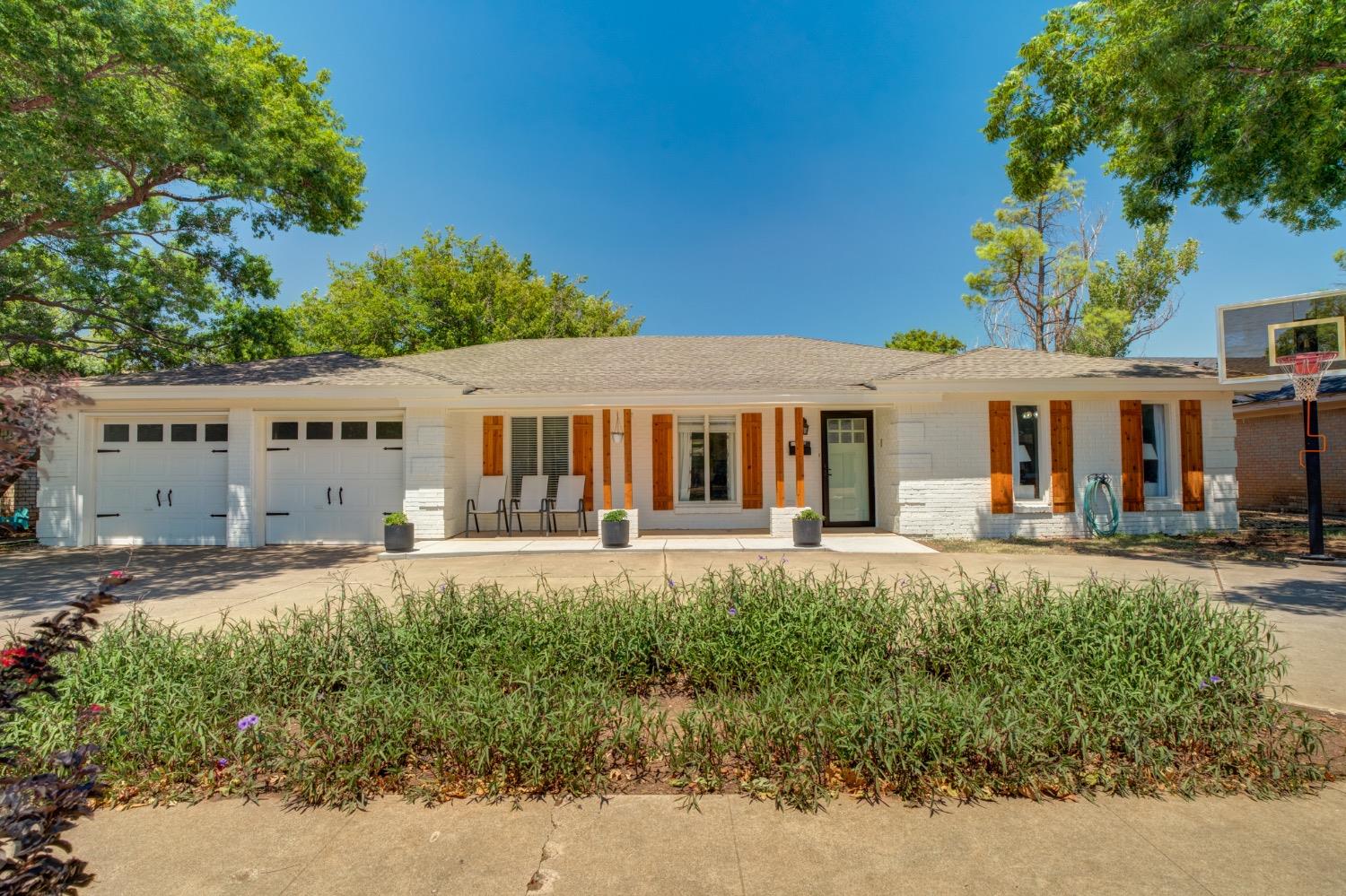 front view of a house with a big yard