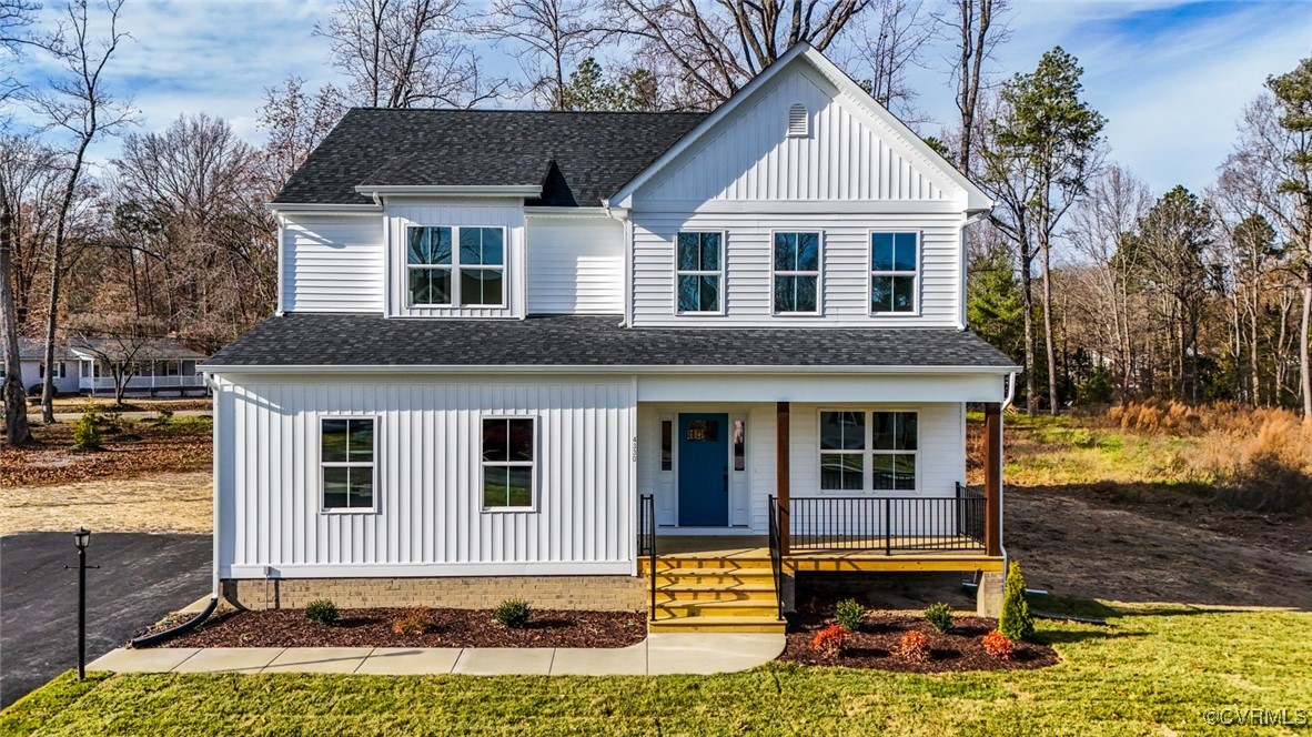 View of front of property with a porch and a front